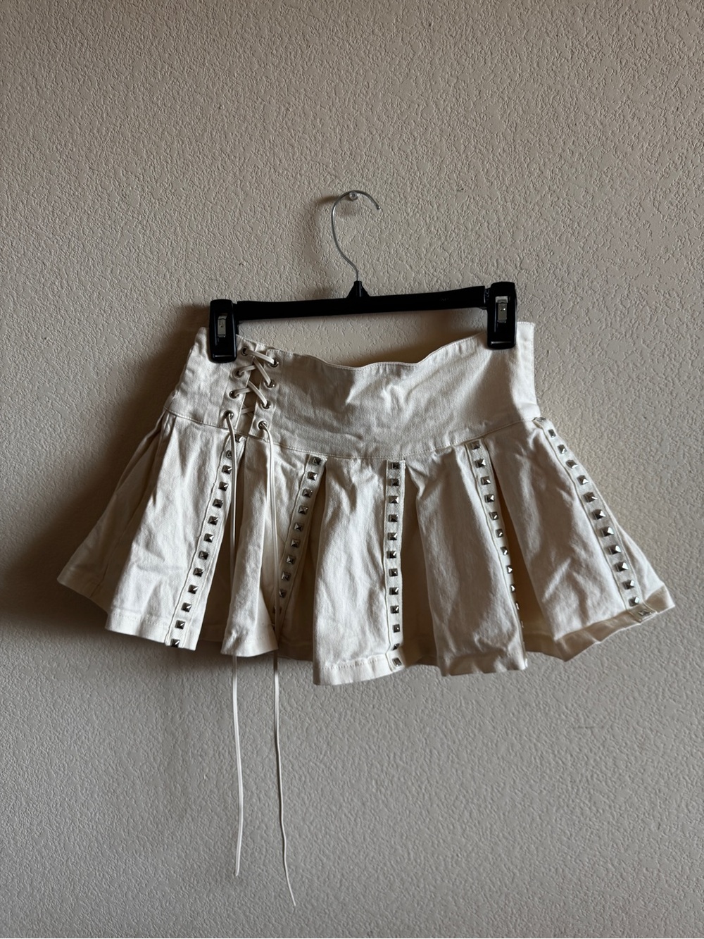 french kyss White Lace-Up Pleated Mini Skirt with Stud Trim
